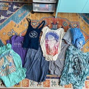 Lot of yoga themed shirts and tops